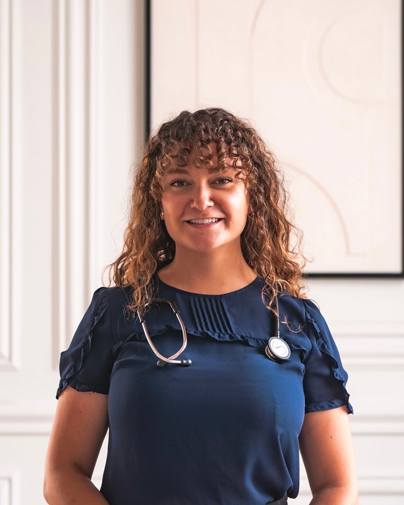 Dr. Erinn Musial, Naturopathic Doctor with a stethoscope at DC Chiropractic Markham.