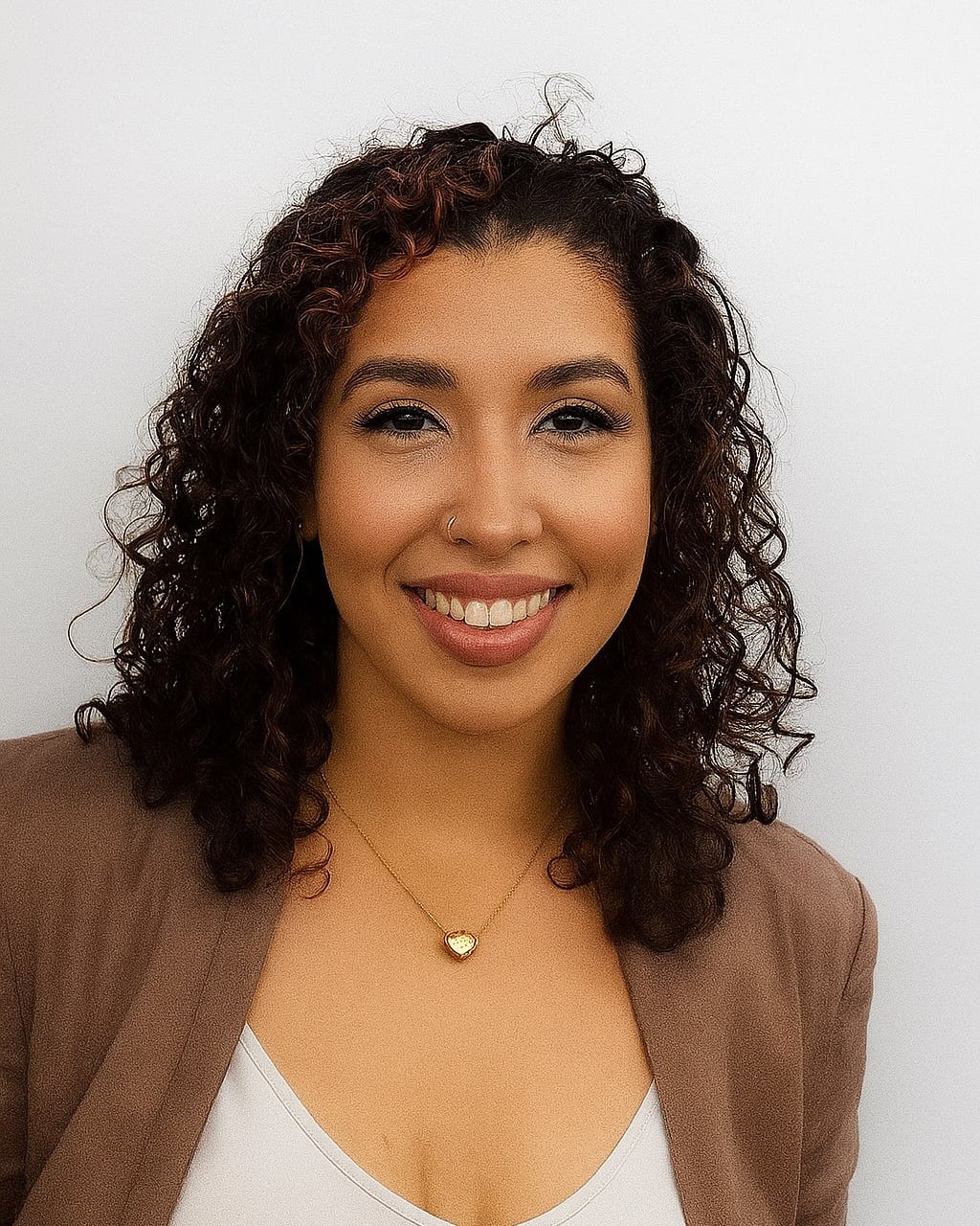 Celina, Registered Massage Therapist (RMT) at DC Chiropractic Markham, professional smiling portrait.